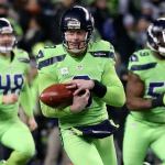 Seahawks punter Jon Ryan bobbles the ball at CenturyLink Field Thursday night in Seattle on December 15, 2016. (Kevin Clark / The Herald)