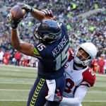Seahawks wide receiver Jermaine Kearse makes a touchdown reception with Cardinals corner back Justin Bethel defending Saturday afternoon at CenturyLink Field in Seattle on December 24, 2016. The Cardinals won 34-31. (Kevin Clark / The Herald)