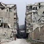 In this Dec. 5 photo, A Syrian man pushes a baby stroller as he walks past anti-sniper curtains remaining in a street in Aleppo, Syria. Aleppo shakes with explosions and gunfire day and night in both the government and rebel sides. (AP Photo/Hassan Ammar)