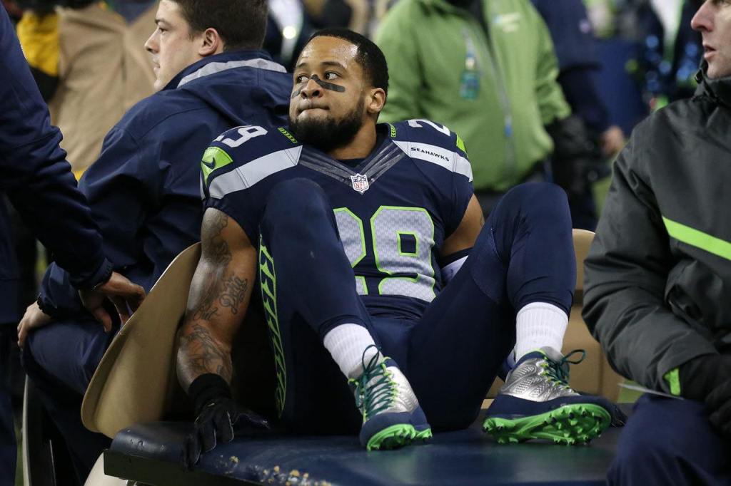 Seahawks safety Earl Thomas is carted off the field Sunday night at CenturyLink Field in Seattle on December 4, 2016.(Kevin Clark / The Herald)