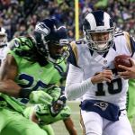 Seahawks corner back Richard Sherman knocks Rams quarterback Jared Goff out of bounds just shy of the endzone at CenturyLink Field Thursday night in Seattle on December 15, 2016. (Kevin Clark / The Herald)