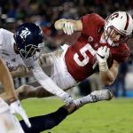 Stanford running back Christian McCaffrey (5) leaps into the end zone to complete a 23-yard touchdown reception in a game last month against Rice. McCaffrey announced Wednesday he will skip his senior season to enter the NFL draft. (AP Photo/Marcio Jose Sanchez, File)
