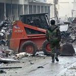 This frame grab from a Dec. 13 video shows Syrian soldiers walking among damaged buildings on a street filled with debris near the ancient Umayyad Mosque, in the Old City of Aleppo, Syria. A cease-fire deal between rebels and the Syrian government in the city of Aleppo has effectively collapsed, Wednesday, Dec. 14, with fighter jets resuming their devastating air raids over the opposition&rsquo;s densely crowded enclave in the east of the city. (AP Photo)