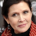 In this April 7, 2011 photo, Carrie Fisher arrives at the 2011 NewNowNext Awards in Los Angeles. On Tuesday, Dec. 27, a publicist said Fisher has died at the age of 60. (AP Photo/Chris Pizzello, File)