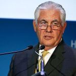 ExxonMobil CEO and chairman Rex W. Tillerson gives a speech at the annual Abu Dhabi International Petroleum Exhibition & Conference in Abu Dhabi, United Arab Emirates, on Nov. 7. (AP Photo/Jon Gambrell)