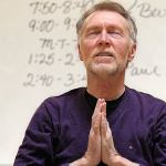 From a seat on an electric scooter, and with wife Diane Brooks nearby, Paul MacNaughton leads a yoga class at Everett Community College on April 25, 2013. MacNaughton died Dec. 16 following a long battle with bone cancer. (Dan Bates / The Herald)