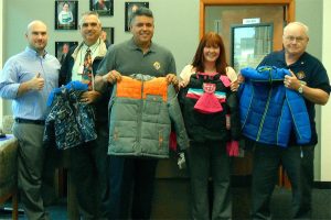 Knights donate coats to Marysville school kids