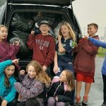 Students help Elks collect toys, books for Christmas House