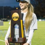 Western Washington University soccer player Erin Russell poses with the national championship trophy after the Vikings defeated Grand Valley State 3-2 last Saturday. (Morgan Stilp/ WWU)