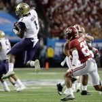 Washington wide receiver John Ross makes the catch during Saturday&rsquo;s Peach Bowl in Atlanta. (AP Photo/David Goldman)