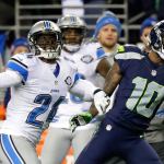 Seahawks wide receiver Paul Richardson makes a one-handed catch ahead of Lions cornerback Nevin Lawson in the second half of Saturday&rsquo;s game. (AP Photo/Elaine Thompson)
