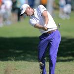 Justin Thomas hits from the third fairway during the second round of the Sony Open on Friday in Honolulu. Thomas shot a 64 on Friday to set the PGA record for 36-hole scores. (AP Photo/Marco Garcia)