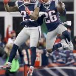 New England&rsquo;s Logan Ryan (26) celebrates his interception with Patrick Chung (left) during the second half the Patriots&rsquo; 34-16 win over Houston in an AFC divisional playoff game on Saturday in Foxborough, Mass. (AP Photo/Elise Amendola)