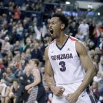 Gonzaga&rsquo;s Johnathan Williams celebrates after a dunk during the first half of the Bulldogs&rsquo; emphatic 79-56 win over Saint Mary&rsquo;s on Saturday in Spokane. (AP Photo/Young Kwak)