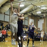 Kamiak&rsquo;s Carson Tuttle (left) goes up for a layup during a game against Lake Stevens at Kamiak High School in Mukilteo on Tuesday. (Ian Terry / The Herald)