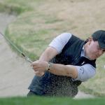 Phil Mickelson holes out from the bunker on the first hole during the second round of the CareerBuilder Challenge on the Jack Nicklaus Tournament Course at PGA West on Friday in La Quinta, Calif. (AP Photo/Chris Carlson)