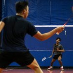 Lasitha Menaka (right) watches the birdie bounce off his opponent Jay Yang&rsquo;s racquet at the newly opened Harbour Pointe Badminton Club in Mukilteo during a tournament on Saturday, Jan. 21. (Ian Terry / The Herald)