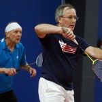Geoff Stensland (right), of Lake Stevens, prepares to serve while his partner Rob Hankins, of Seattle, stands ready during a doubles tournament at the newly opened Harbour Pointe Badminton Club in Mukilteo during a tournament on Saturday, Jan. 21. Stensland owns the new facility which houses twelve courts, a pro shop and weight training facilities. (Ian Terry / The Herald)