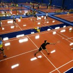 Players compete in a doubles tournament held across twelve courts at the newly opened Harbour Pointe Badminton Club in Mukilteo during a tournament on Saturday, Jan. 21. (Ian Terry / The Herald)