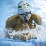 Jackson&rsquo;s Bryan Phung powers to the win in the 100-yard breaststroke event during a meet against Kamiak on Tuesday at West Coast Aquatics in Mill Creek. (Ian Terry / The Herald)
