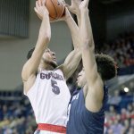 Gonzaga&rsquo;s Nigel Williams-Goss (5) shoots over San Diego&rsquo;s Olin Carter III during the first half of the Bulldogs&rsquo; 79-43 win over the Toreros on Thursday in Spokane. (AP Photo/Young Kwak)