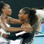 Serena Williams (right) and her sister, Venus (left) embrace after Serena defeated Venus in straight sets to win the Australian Open singles title on Saturday in Melbourne. It was Serena&rsquo;s 23rd major championship, breaking Steffi Graf&rsquo;s record for most in the Open era. (AP Photo/Kin Cheung)