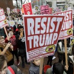 Portland Trump protesters burn flags, 100s march in Seattle