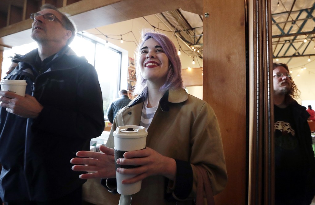 Portland Trump protesters burn flags, 100s march in Seattle