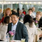 Developer Lobsang Dargey (center) attends a sneak peak event at Potala Place Everett on April 30, 2015. (Ian Terry / Herald file)
