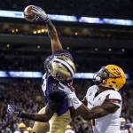 Washington defensive back Kevin King intercepts a touchdown pass intended for Arizona State&rsquo;s N&rsquo;Keal Haeey Saturday at Husky Stadium in Seattle November 19, 2016. No. 7 Washington rolls past Arizona State, 44-18. (Kevin Clark / The Herald)