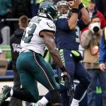 Seahawks quarterback Russell Wilson makes a reception from Seahawks wide receiver Doug Baldwin for a touchdown with Eagles linebacker Nigel Bradham trailing at Century Link Field in Seattle on Nov. 20, 2016. Seahawks won 26-15. (Kevin Clark / The Herald)