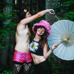 Mike Richardson and his girlfriend Celeah Norris pose for a portrait during day one of Summer Meltdown on Aug. 11, 2016, in Darrington. The annual music festival runs four days with live music, art installations, workshops and on-site camping for attendants. (Daniella Beccaria / For The Herald)