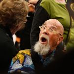 During the reception for him at Shack, Chuck Close is surprised by a visit from Margo Monteiro of San Diego, who went to grade school through high school with him. (Dan Bates / The Herald)
