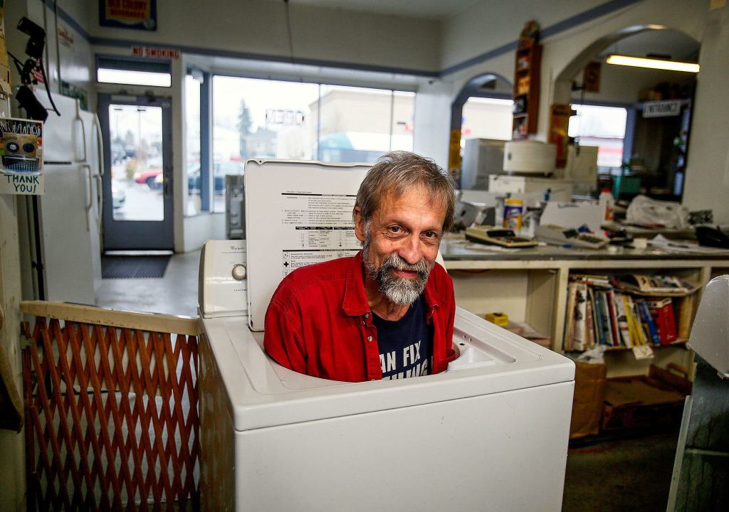 Dale Frisk runs an appliance repair shop on Broadway in Everett with a good sense of humor. (Dan Bates / The Herald)