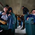 During a pre-flight talk to the passengers, foundation president John Sessions warned that although no injuries have occured on previous flights, one possilble side effect can be facial strain, caused by excessive smiling. Preparing for take off, only moments after boarding, it appears that WWII pilots Elden Larson and Art Unruh, both 93, are already showing symptoms. (Dan Bates / The Herald)