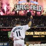 The Mariners&rsquo; Edgar Martinez waves his cap as fireworks go off while he is introduced at a post-game ceremony honoring his pending retirement on Oct. 2, 2004, in Seattle. (AP Photo/Elaine Thompson)