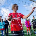 Linda Kautz poses with some of the kids and coaches who participate in TOPSoccer of Snohomish on Friday, Dec. 30, 2017 in Snohomish, Wa. US Youth Soccer, which oversees programs for kids across the country, has named Kautz one of four regional finalists for the 2016 TOPSoccer Coach of the Year award. (Andy Bronson / The Herald)