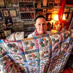 Karyn Nilson of Arlington acquired a partially completed quilt at a yard sale and finished it. She recently located the original intended recipient. (Dan Bates / The Herald)
