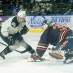 Everett Silvertip right winger Patrick Bajkov (left) loses control of the puck as he attepts to push it past Kamloop Blazer goalie Dylan Ferguson during the second period of Sunday night&rsquo;s game. (Doug Ramsey / For The Herald)