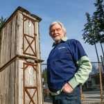 What&rsquo;s Up about the two-story Politician/Voter outhouse behind Rustic Cuts barbershop in Silver Lake? Barber Don Baird, 76, built the outhouse from barnwood he had leftover when he built his barbershop 6 years ago as a statement about how voters get dumped on. (Dan Bates / The Herald)