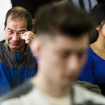 Hung Bui (left), fights back tears with daughter Anny Bui during the sentencing for Allen Ivanov who shot and killed Bui&rsquo;s daughter Anna, along with two others, at a house party in Mukilteo on July 30, 2016. Ivanov was sentenced to life in prison in Snohomish County Superior Court in Everett on Thursday morning. (Ian Terry / The Herald)