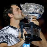 Switzerland&rsquo;s Roger Federer kisses his trophy after defeating Spain&rsquo;s Rafael Nadal during the men&rsquo;s singles final at the Australian Open tennis championships in Melbourne, Australia, Sunday, Jan. 29, 2017. (AP Photo/Aaron Favila)