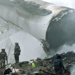 The wreckage of a crashed Turkish Boeing 747 cargo plane at a residential area outside Bishkek, Kyrgyzstan, on Monday. (AP Photo/Vladimir Voronin)