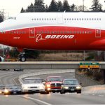 A Boeing 747-8 Intercontinental is moved across Highway 526 from the Everett assembly plant to the fuel dock in 2011. (Michael O&rsquo;Leary/The Herald)