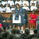 Bernice King, daughter of the late Rev. Martin Luther King Jr., speaks during the King holiday commemorative service at Ebenezer Baptist Church, where King preached, in Atlanta on Monday. (AP Photo/Branden Camp)