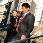 Lobsang Dargey leaves the U.S. District Court building in Seattle on Wednesday, Jan. 4, after pleading guilty to fraud charges. He was released pending sentencing. (Dan Catchpole / Everett Herald)