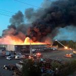 Firefighters from throughout Snohomish County battled a massive three-alarm warehouse fire along the Snohomish River in north Everett on June 4, 2016. (Doug Ramsay / Herald file)