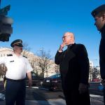 Michael Wagner, chief planner for the Defense Department and the main coordinator for the inauguration committees of Congress and President-elect Donald Trump, works with Army Staff Sgt. Christopher Delzell (left) and Air Force 2nd Lt. Jared Johnson (right) on logistics for the inauguration. (Amanda Voisard for The Washington Post)