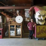 This Jan. 6 photo shows Jeff Shadic, manager of Park Decor and Visual Display, standing among some of the items being auctioned off by Knott&rsquo;s Berry Farm in Buena Park, California. (Kevin Sullivan/The Orange County Register via AP,File)