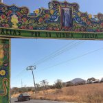 An arch welcomes visitors to Molcaxac, Puebla, Mexico. Folks here say so many working-age residents have migrated to the U.S., the town is mostly populated by the elderly and the very young. (AP Photo/Peter Orsi)